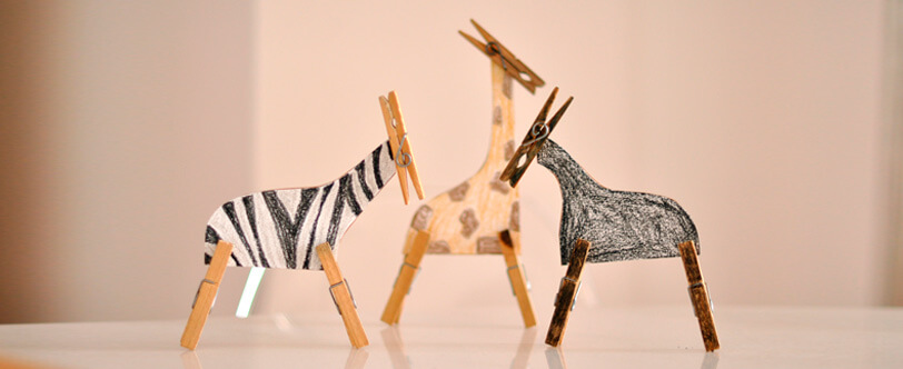 animais de papel criados com pregadores de roupa